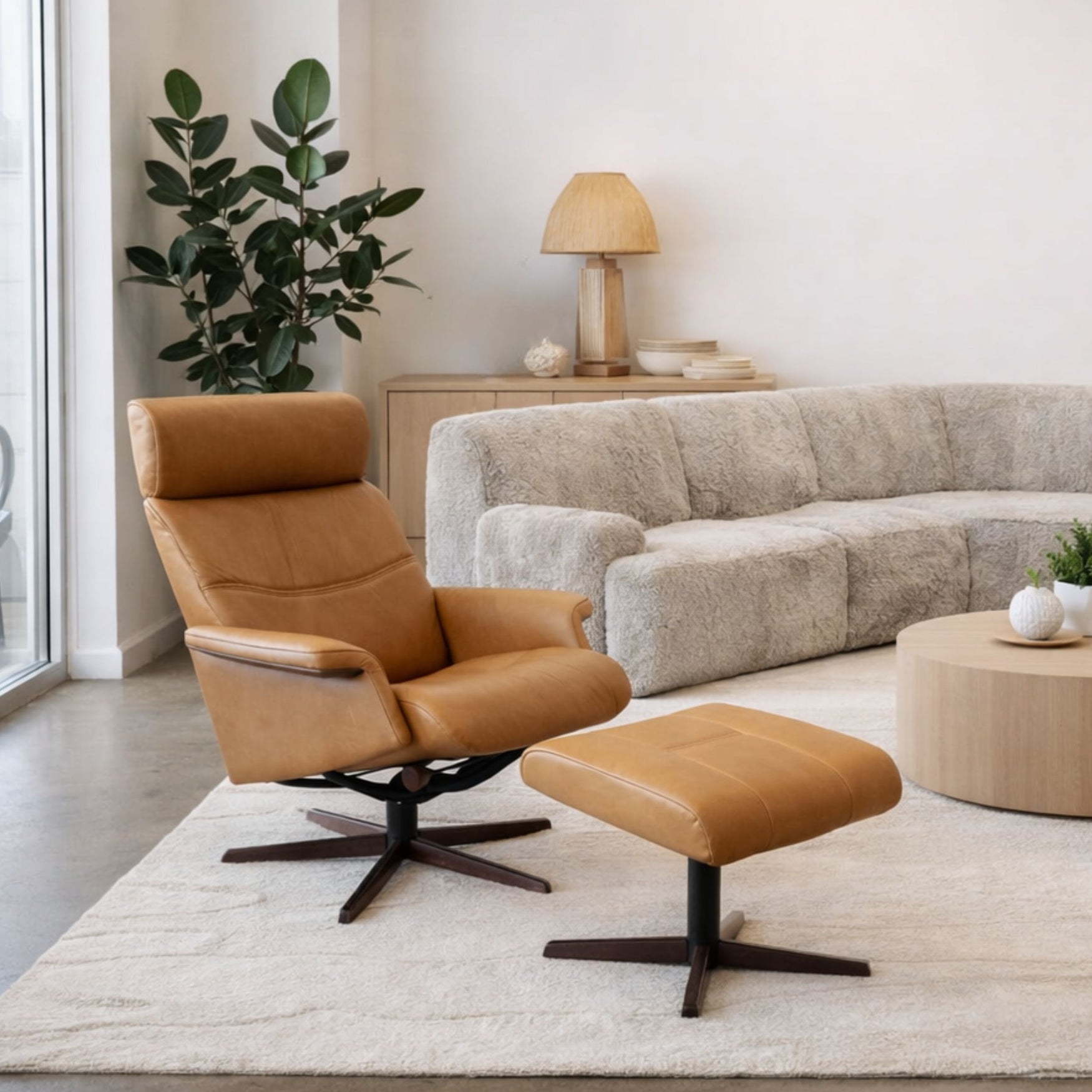 Pascal Motion Chair & Footstool in Leather